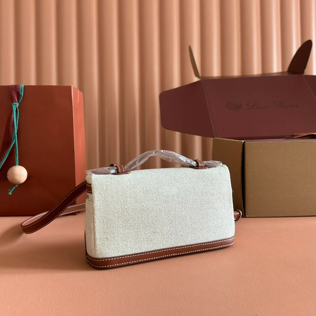 p1160💋💋💋【Original leather all-steel configuration counter complete package】 𝐋𝐨𝐫𝐨 𝐏𝐢𝐚𝐧@ Extra pocket L19 series handbag/crossbody bag The most comfortable life is when it is not defined, just like loro The material design of pian@ does not require complicated design styles. The simple and soft outline is elegant and durable, like an exquisite cosmetic case, which perfectly balances appearance and functionality. The leather is delicate and feels as soft as butter. The small bag has a large capacity. It is not only portable with a thin shoulder strap, but can also be worn cross-body. Sisters who have a special liking for minimalist style can buy it. It is simple and versatile. The simpler, the more different. Stars and Instagram celebrities are all planting it. There are two sizes of 19 cm and 27 cm. One is exquisite and casual, and the other is elegant and grand. Size: Small: length 19×width 7×height 12cm (